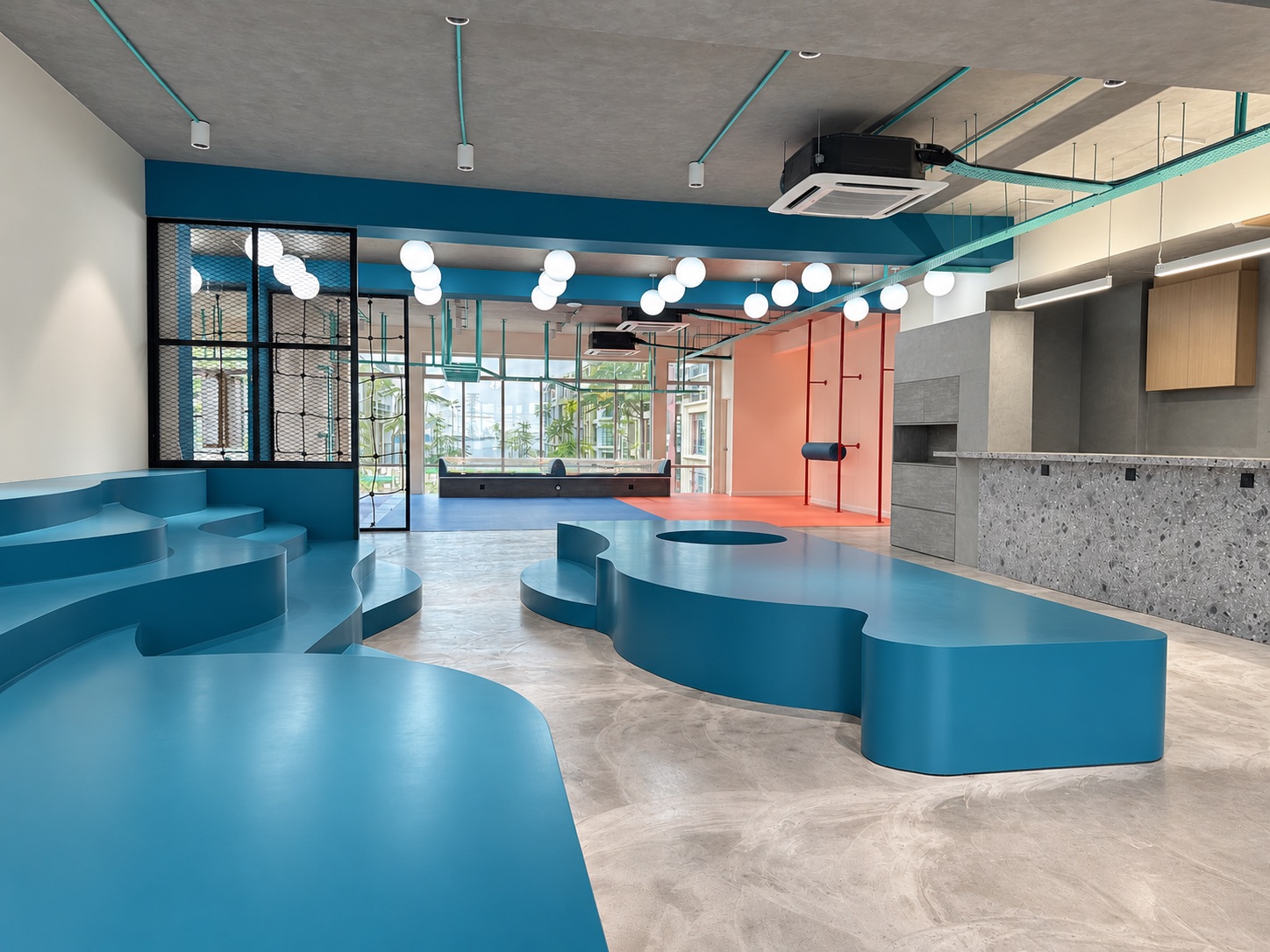 Completed office fit-out with a sculptural social hub and collaborative seating