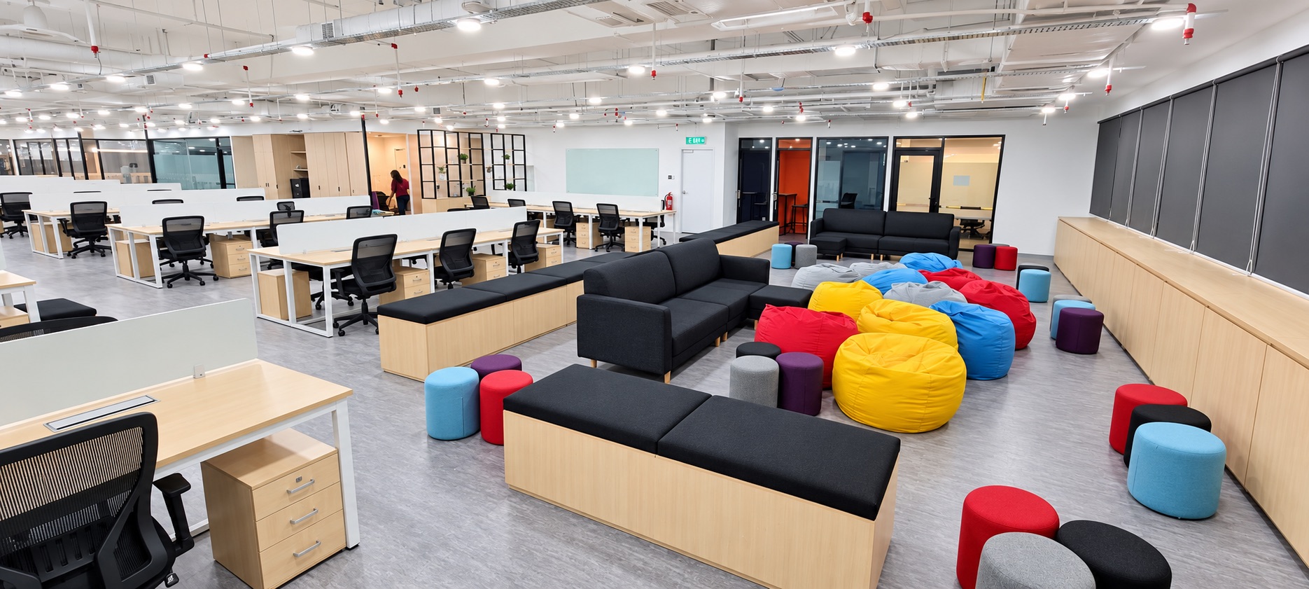 Completed open workplace and collaboration lounge delivered through a design-and-build process