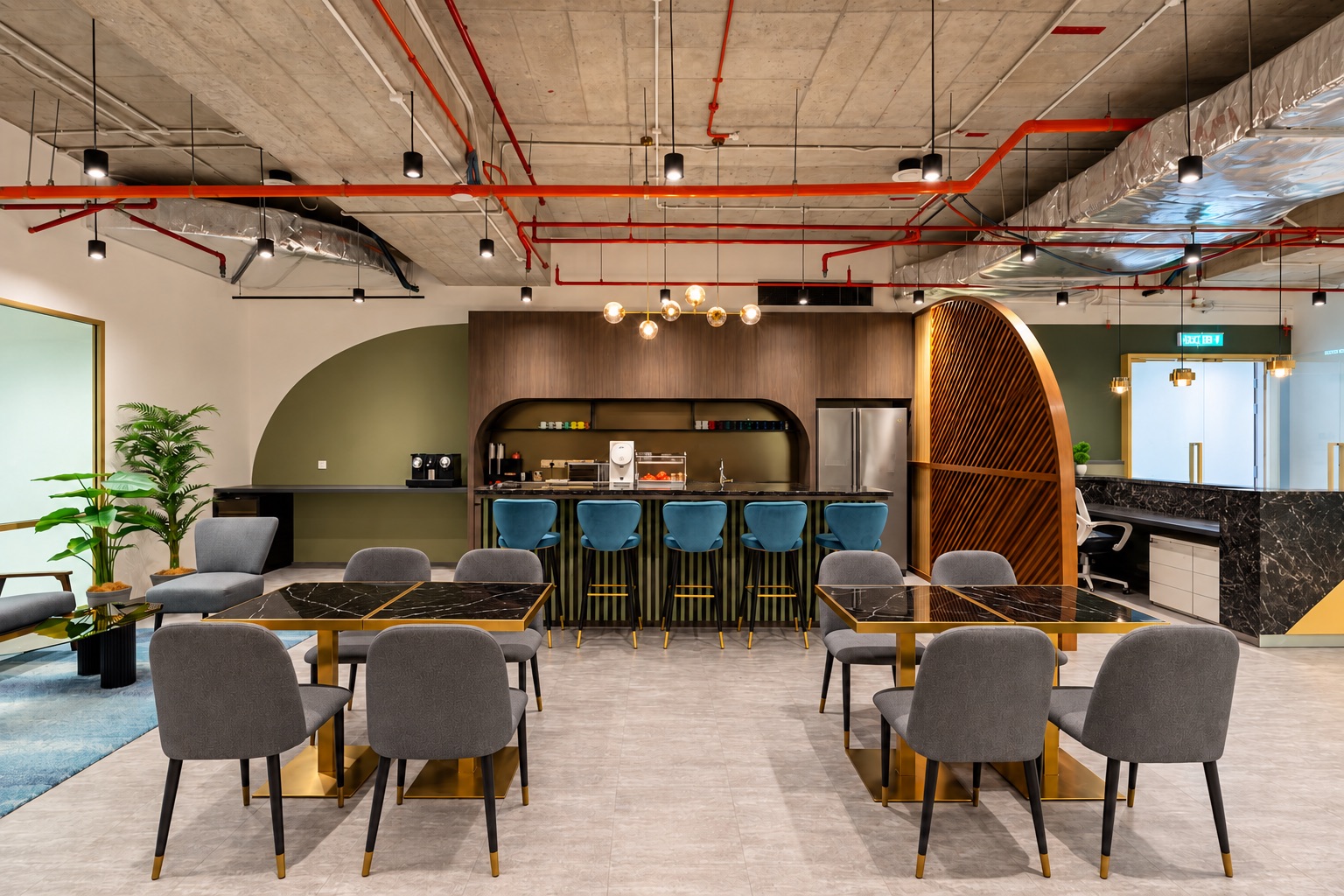 Completed office cafe showing joinery, lighting, furniture and integrated building services